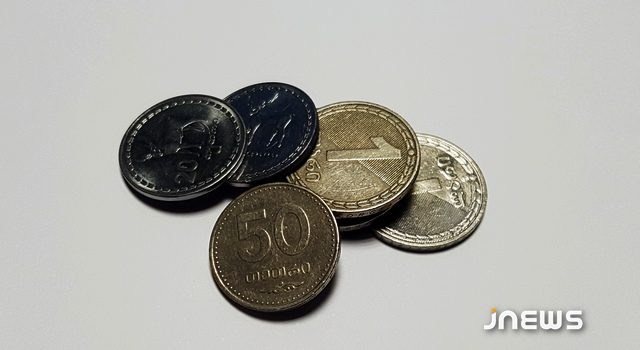 Монеты номиналом 1 и 2 тетри изымут, сумма оплаты будет округляться